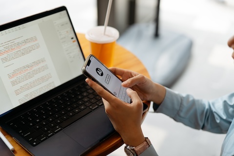 A woman is using generative AI on her mobile phone